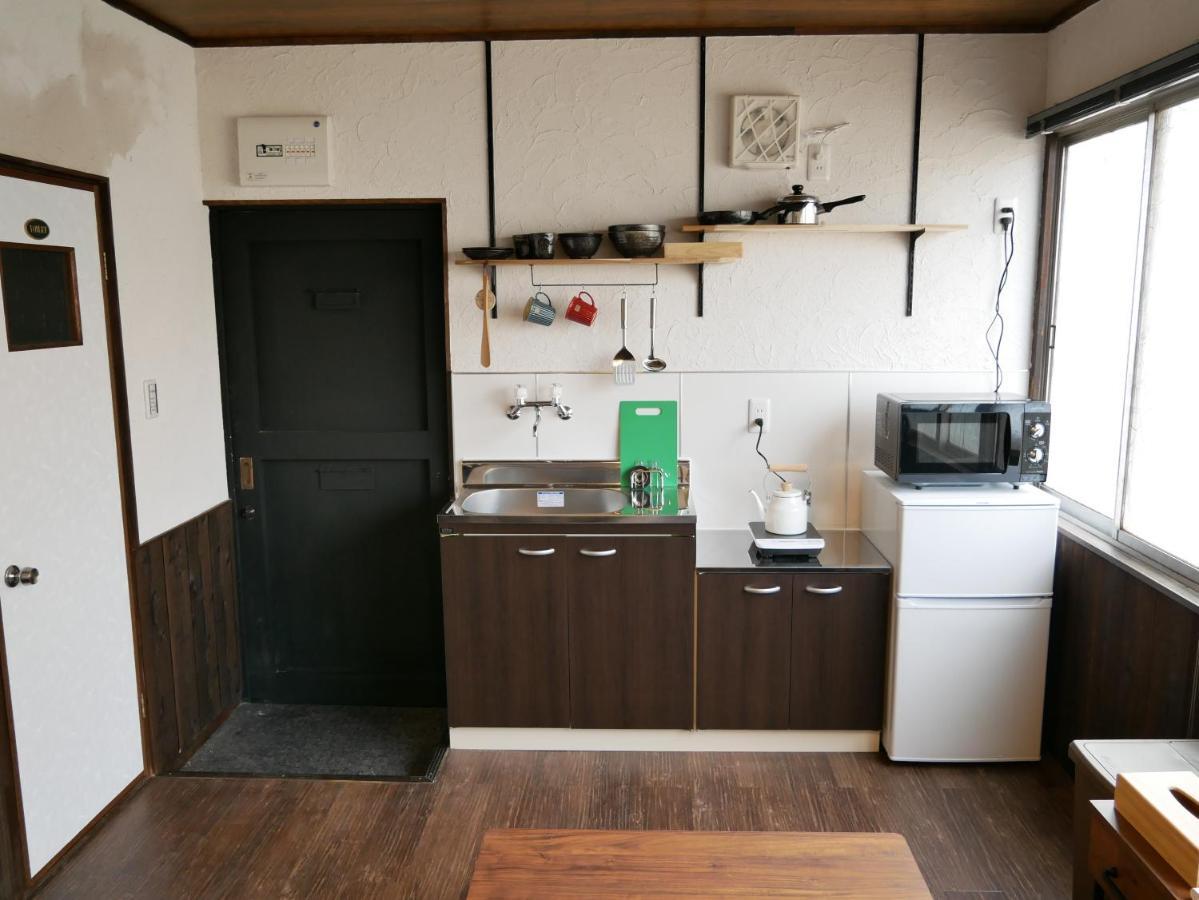Guest House Kishinosato Ōsaka Extérieur photo